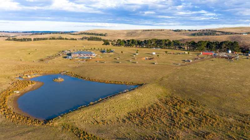 Australian rural property held in SMSF with farmland in background, representing illiquid assets subject to Division 296 super tax