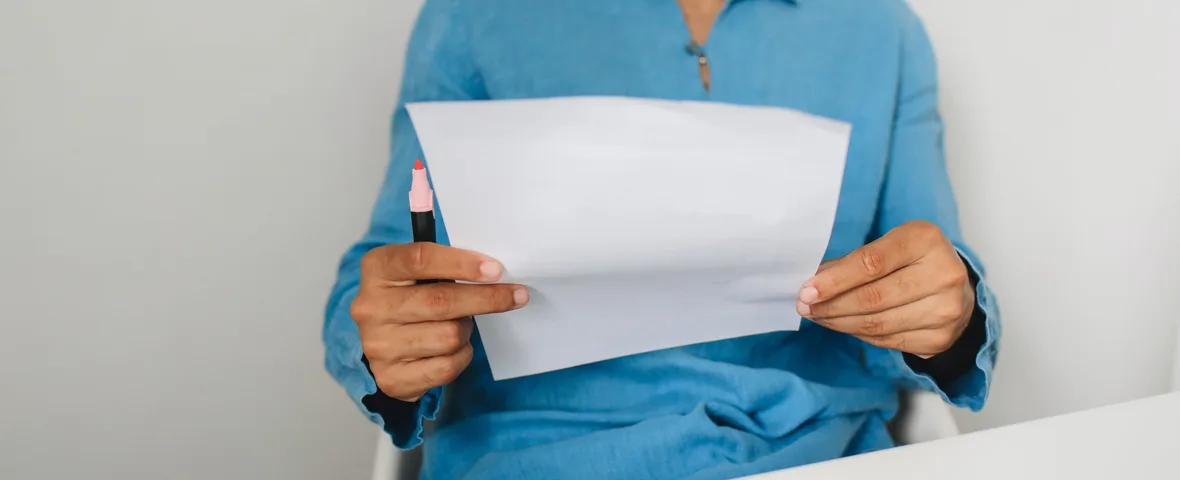 Australian employee reading payslip letter to check superannuation payment under new payday super rules