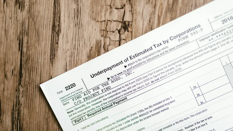 ATO compliance letter on desk representing employer penalty for unpaid superannuation guarantee contributions